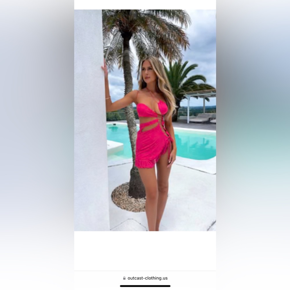 Great cut out mini dress designed by OUTCAST clothing.
